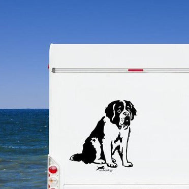 Schwarzer Bernhardiner Aufkleber auf einem weißen Wohnmobil am Meer – wetterfestes Aufkleber-Motiv von amberdog